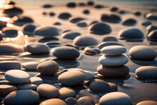 A Soft Morning Light Illuminating A Stack Of Zen Stones