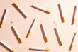 World no tobacco day concept template. Flat layout of cigarettes or tobacco on brown background.