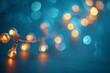 Artistic capture of bokeh lights, with a warm orange tone glow scattered across a cool blue backdrop