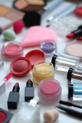 Wall Mural - Various colorful beauty products on white background. Selective focus.