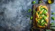 Braided wild garlic pesto brioche Homemade raw or uncooked fresh pull apart bread with wild garlic pesto on wooden board on old grey background table Italian bread Copy space Top view : Generative AI