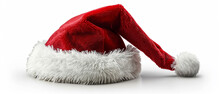 Iconic Red Santa Claus Hat With Its Fluffy White Trim And Pompom, Isolated On A White Background, A Symbol Of Christmas Cheer, Holiday Warmth, And The Festive And Merriment