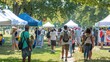 © Julia Jones - Outdoor summer fair with diverse people walking between booths.