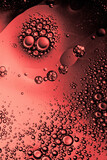 Fototapeta Tęcza - abstract red liquid with air bubbles