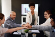 © peopleimages.com - Business people in meeting, stack and hands together for cooperation, teamwork or planning. Portrait, leader or group with unity or collaboration with corporate professional, project or brainstorming