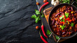 Food concept Homemade Chili con carne on wooden board and black slate stone background with copy space : Generative AI
