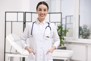 Sticker - Portrait of medical consultant with stethoscope in clinic