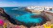 Panoramic view of the fishing coastal town El Cotillo in the municipality of la Oliva and the blue natual lagoon in Fuerteventura -  Province of Las Palmas, Canary Islands, Spain