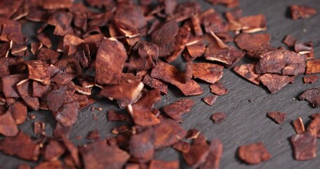 Wall Mural - coconut chips in chocolate, roasted and dried in chocolate and cocoa with sugar coconut pulp