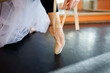© Tetra Images - Close-up of ballerinas foot