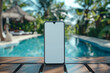 Vertical Smartphone with Blank Screen Centered on Wooden Table by a Serene Pool