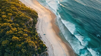 aerial view of coastline and white sand dunes at sunset. anna bay, new south wales, australia