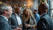 © Ilia Nesolenyi - A group of professionals standing around a bar, engaged in conversations and networking during a social gathering