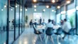 © admin_design - Blurred Corporate Training Session in Progress