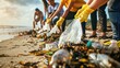 Inspiring photo of a diverse group of people working together, eco volunteers picking up plastic trash on the beach