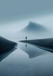 Lonely man standing on the beach looking at a foggy mountain