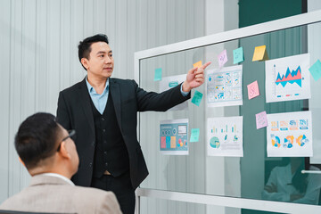 Wall Mural - professional businessman and businesswoman colleague group working together in business teamwork brainstorming in office, corporate team person meeting discussion on project company workplace