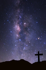 Wall Mural - cross silhouette on mountain with milky way galaxy, night starry sky with stars