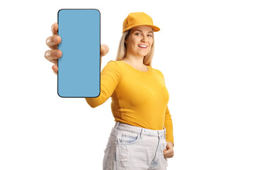 Poster - Young female holding a smartphone with a blue screen