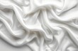 Elegant ivory silk satin drapery   abstract monochrome luxury background with wavy folds
