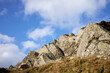 © Fencewood studio - A rocky outcrop against a  blue sky with white clouds at Craignish Point. Ardfern, Argyll and Bute, Scotland