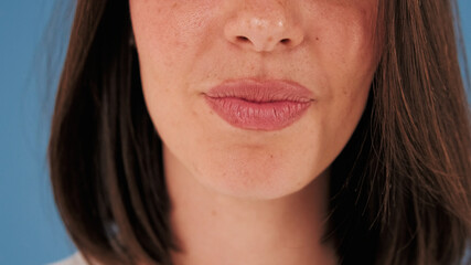 Wall Mural - Detailed close-up shot of young woman's lips