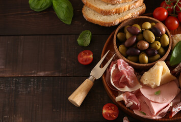 Poster - antipasti tapas with cheese and ham on wooden table