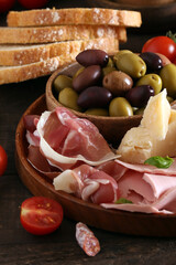 Poster - antipasti tapas with cheese and ham on wooden table