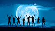 A group of young people jumping under the moonlight by the sea  