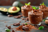 Indulge in a luxurious dessert of chocolate avocado mousse, enriched with cocoa powder and honey for a creamy delight.