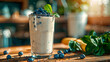 Energize yourself with a protein-packed smoothie blending whey protein, banana, spinach, and a handful of blueberries.