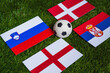 Group C at Europe football tournament in Germany in 2024. Flags of Slovenia, Denmark, Serbia, England and soccer ball on green grass