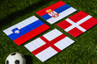 Football Tournament in Germany 2024: Group C, national flags of Slovenia, Denmark, Serbia, England and soccer ball on green grass
