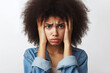 © Ольга Лукьяненко - Afro Woman with stressed facial expression portrait on a white background copy space