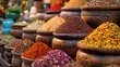 A variety of spices are displayed in wooden bowls. The spices are arranged in a colorful and visually appealing manner