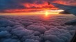 The aerial perspective of clouds and sunset from an airplane window Airplane wing silhouetted against dawn clouds