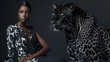 © Ray - beautiful black woman model wearing a tight black and white dress with black high heels standing next to a black leopard with copy space
