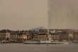 Saharastaub über Genf; Panorama mit Historischem Dampfer und Fontäne Jet d'Eau