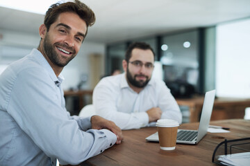 Teamwork, designer or portrait of man on laptop for software, research or web design programming. Developers, happy or programmers in startup office for meeting, discussion or cybersecurity network