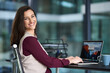 Happy businesswoman and portrait with computer for writing email, connection and agenda. Female employee, laptop and consultant for advice and support while typing startup company project in office