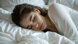© dreamdes - Woman sleeping in white bedding. Healthy living concept. Relaxation and sleep. Health and wellness. Design for banner, poster