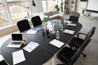 © Pixel-Shot - Table, armchairs, laptop and stationery prepared for business meeting in stylish conference hall
