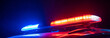 © Daniel - Red and blue lights of a police car at night, stock photo