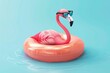 A pink flamingo wearing sunglasses relaxing on an inflatable ring in water.