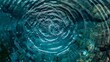 Blue water surface with circular ripples from a water fountain in the center.
