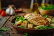 Chicken Caesar salad with Parmesan sauce and croutons on a wood table