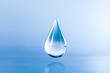 Transluscent water drop on a blue background