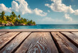 Wooden deck overlooking a tropical beach with palm trees and clear blue water under a sunny sky.