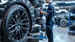 © Matthew - A worker in uniform is seen at an elegant and luxurious car rim repair shop.