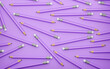 Pattern of violet pencils on a violet background. 3d render